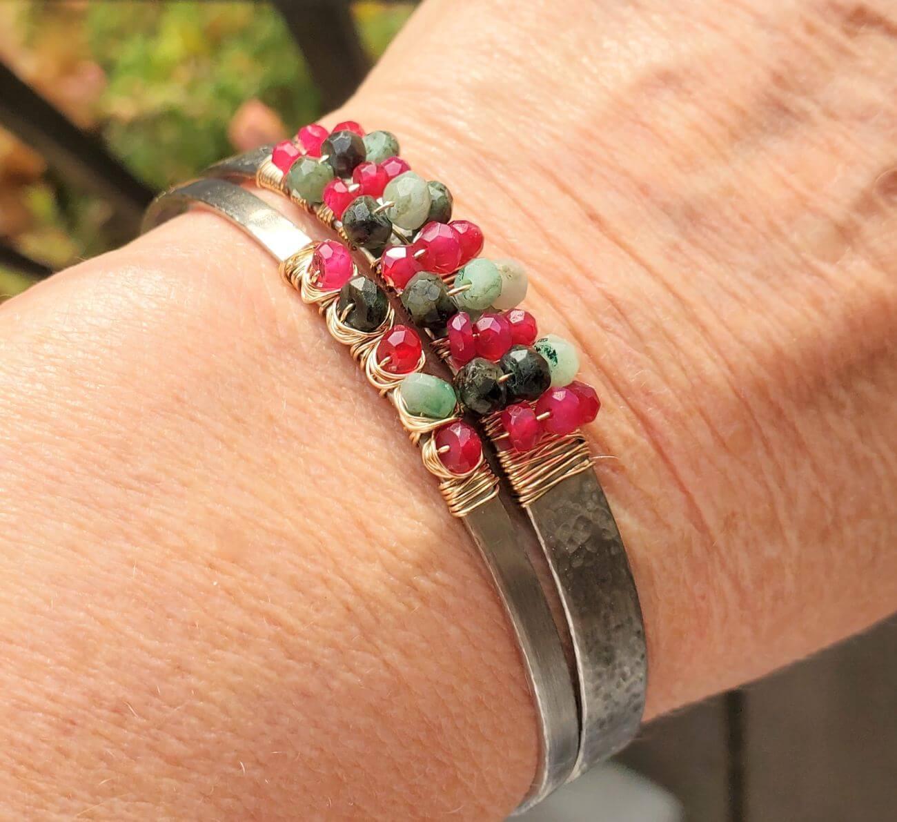 Stainless Steel Handmade Jewelry Collection featuring colorful beaded bracelets on a wrist.