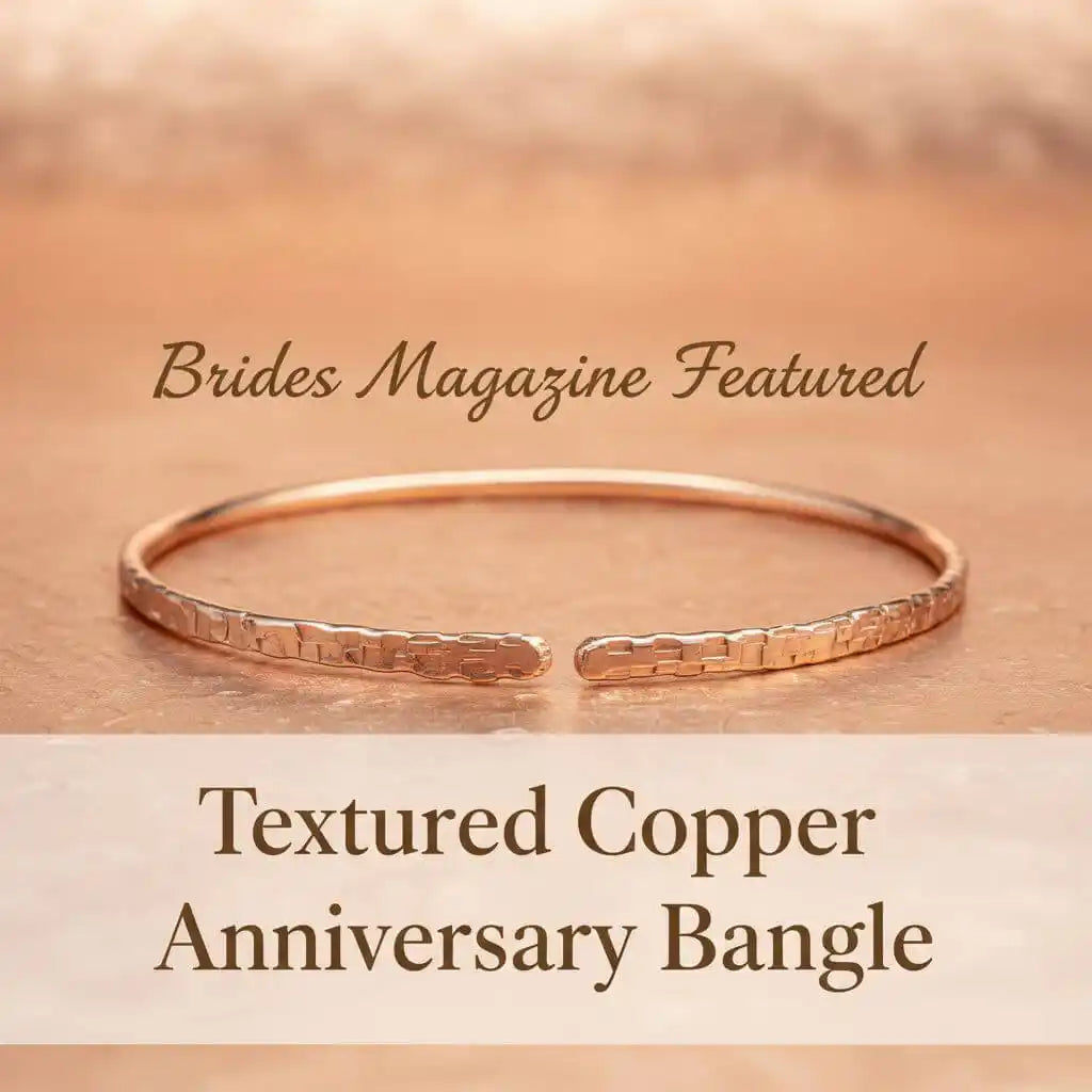 Handmade jewelry bestsellers collection featuring a textured copper anniversary bangle from Brides Magazine.