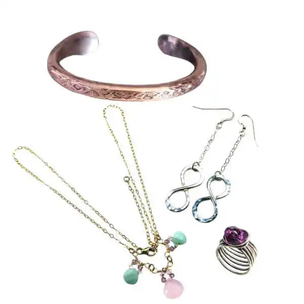 Handmade Jewelry by Material-Copper-Silver-Gold Filled, featuring copper cuff bracelet, gold necklaces, silver earrings, and gemstone ring.