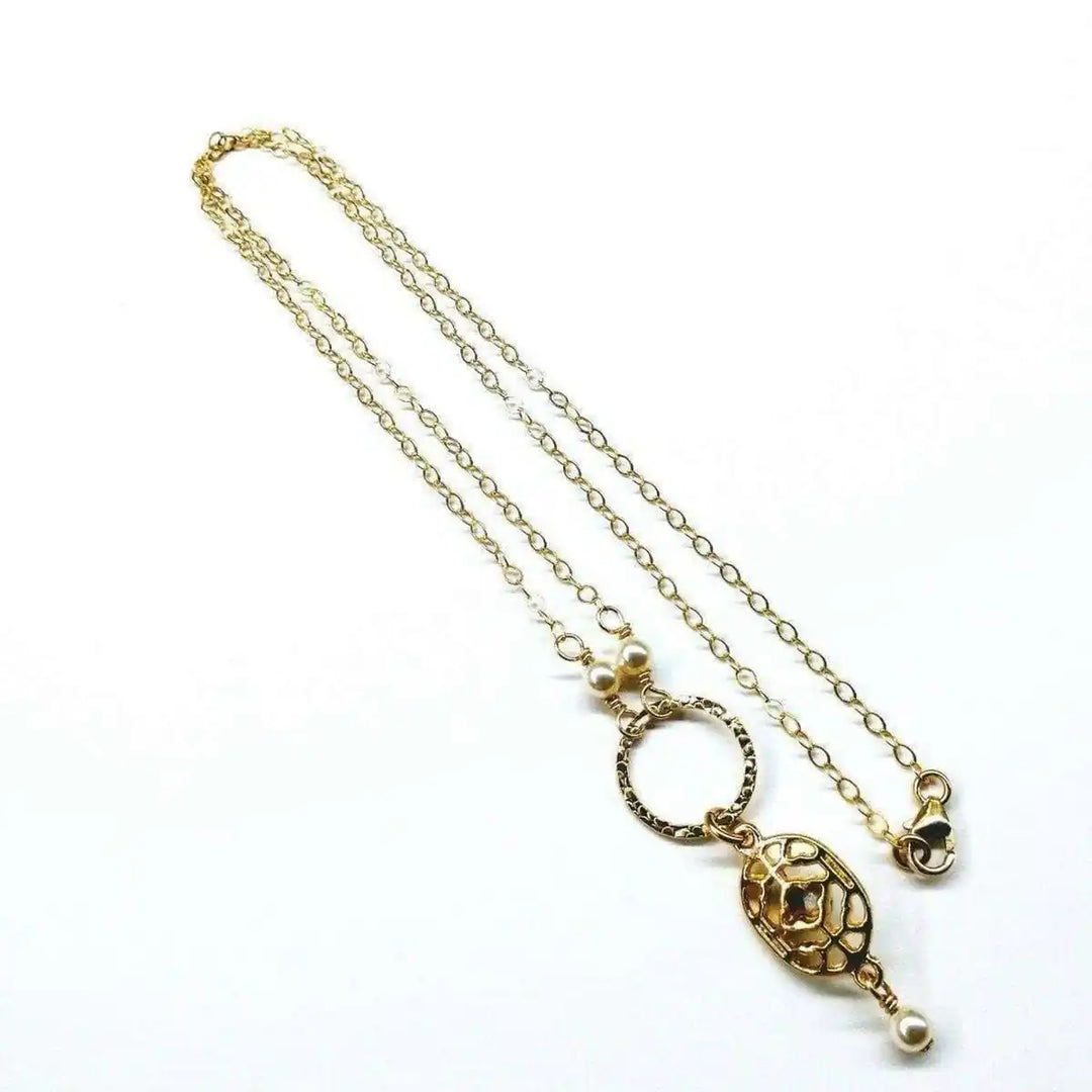 14 K Gold-Filled Hammered Open Circle Filigree Necklace showcasing exquisite artisan design and vintage elegance.