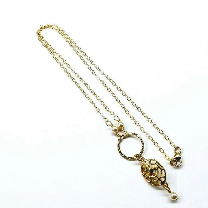 14 K Gold-Filled Hammered Open Circle Filigree Necklace showcasing exquisite artisan design and vintage elegance.