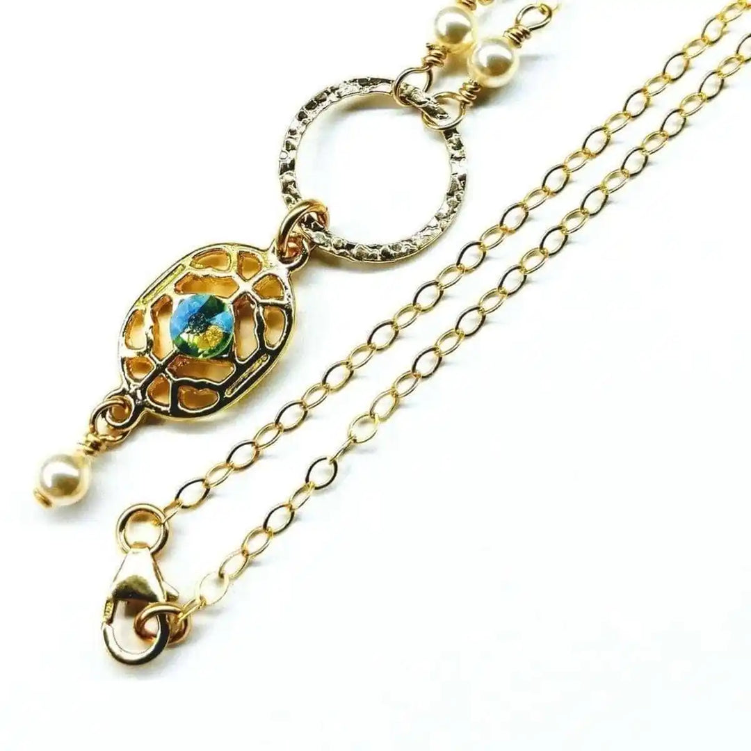 14 K Gold-Filled Hammered Open Circle Filigree Necklace showcasing intricate design and colorful gemstone accents.