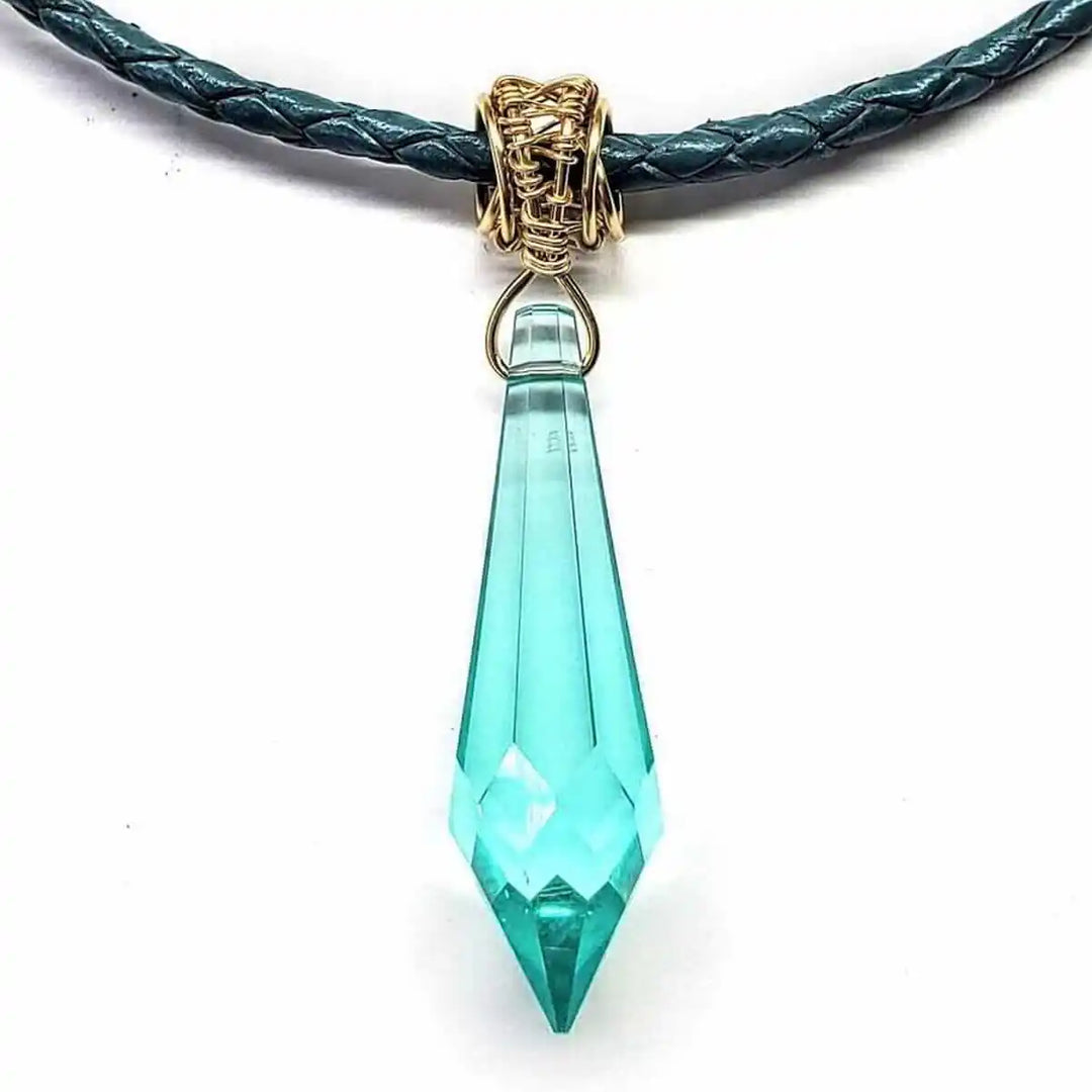 Gold Filled Aqua Crystal Choker Necklace featuring a stunning aqua crystal pendant on a braided leather chain.