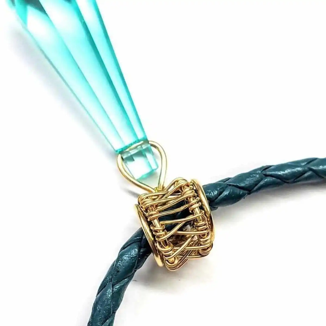 Detail of the Gold Filled Aqua Crystal Choker Necklace featuring aqua crystal and handmade gold wire accents.