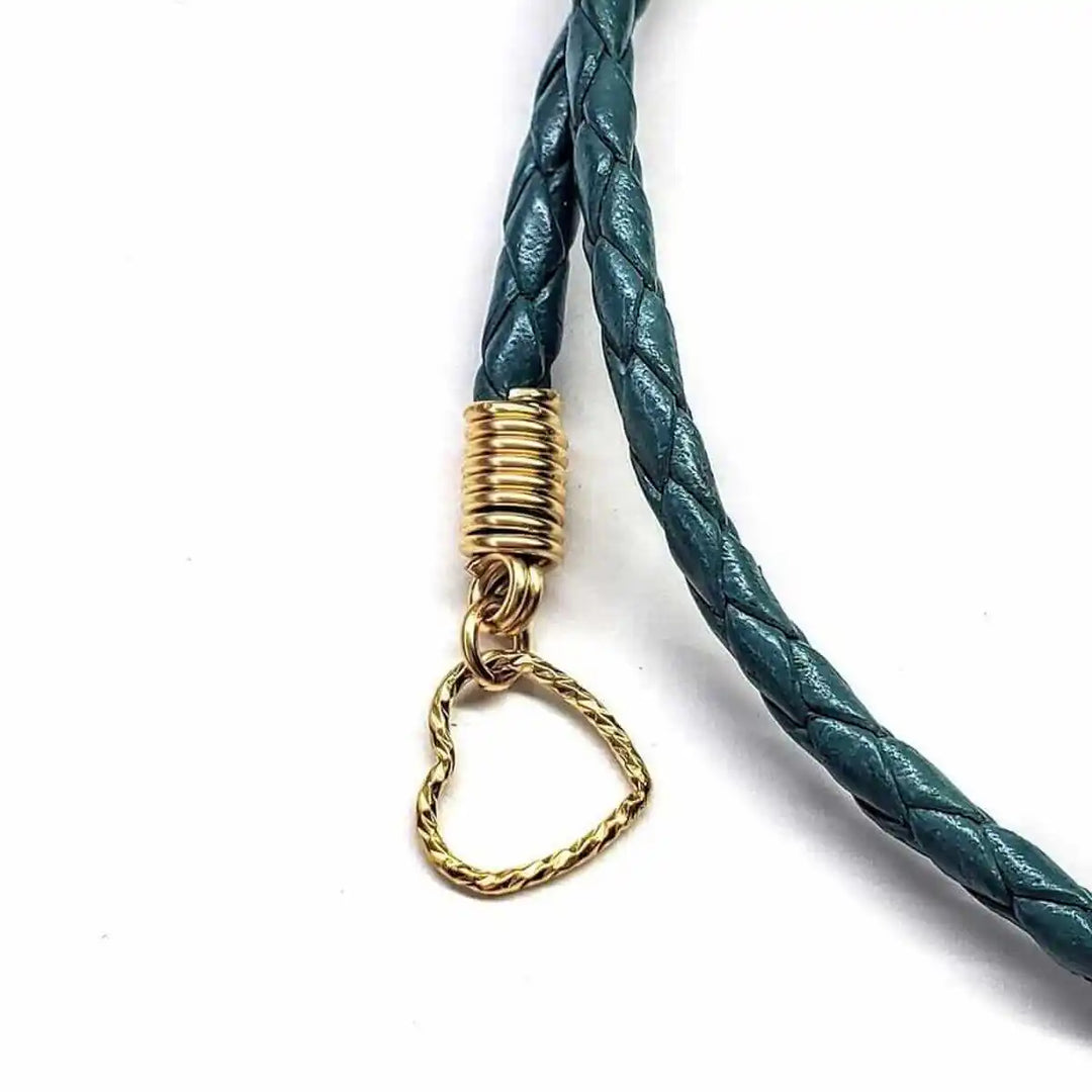 Detail of Gold Filled Aqua Crystal Choker Necklace showing braided teal design and heart clasp.