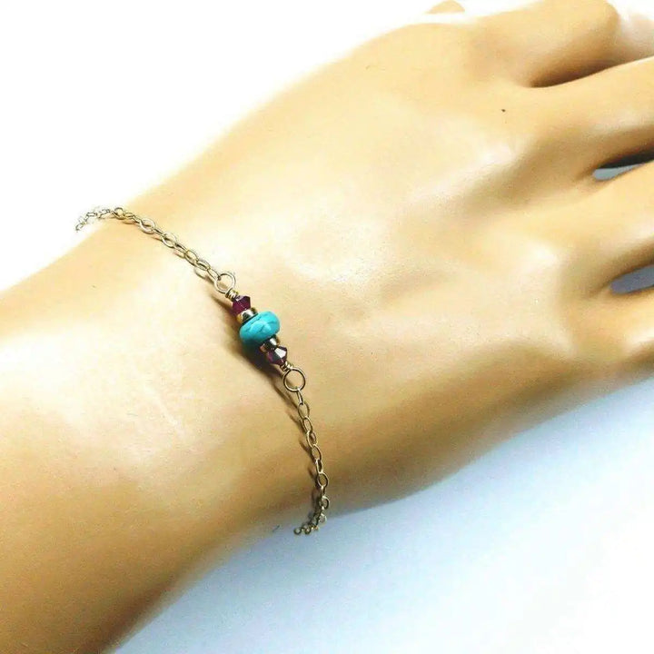 14K Gold Filled Pink and Turquoise Gemstone Dainty Bracelet worn on a hand, showcasing vibrant colors and gold-filled design.