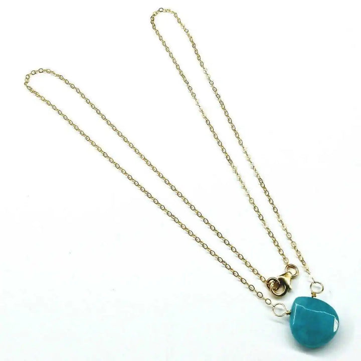 Gold Filled Aqua Jade Wire Wrap Gemstone Drop Necklace showcasing a beautiful aqua jade briolette on a gold chain.