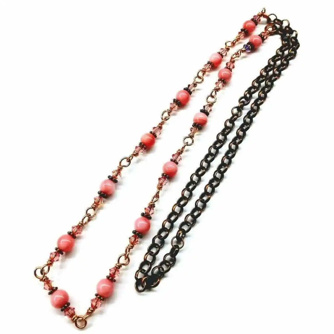 24-Inch Copper Peach Pearl Crystal Wire Wrapped Necklace showcasing copper, peach pearls, and Swarovski crystals on a chain.