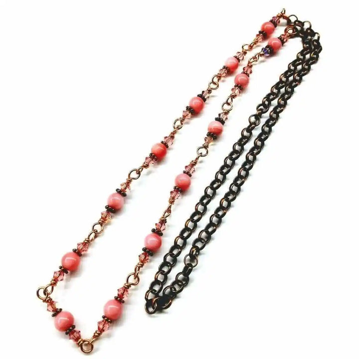 24-Inch Copper Peach Pearl Crystal Wire Wrapped Necklace showcasing copper, peach pearls, and Swarovski crystals on a chain.