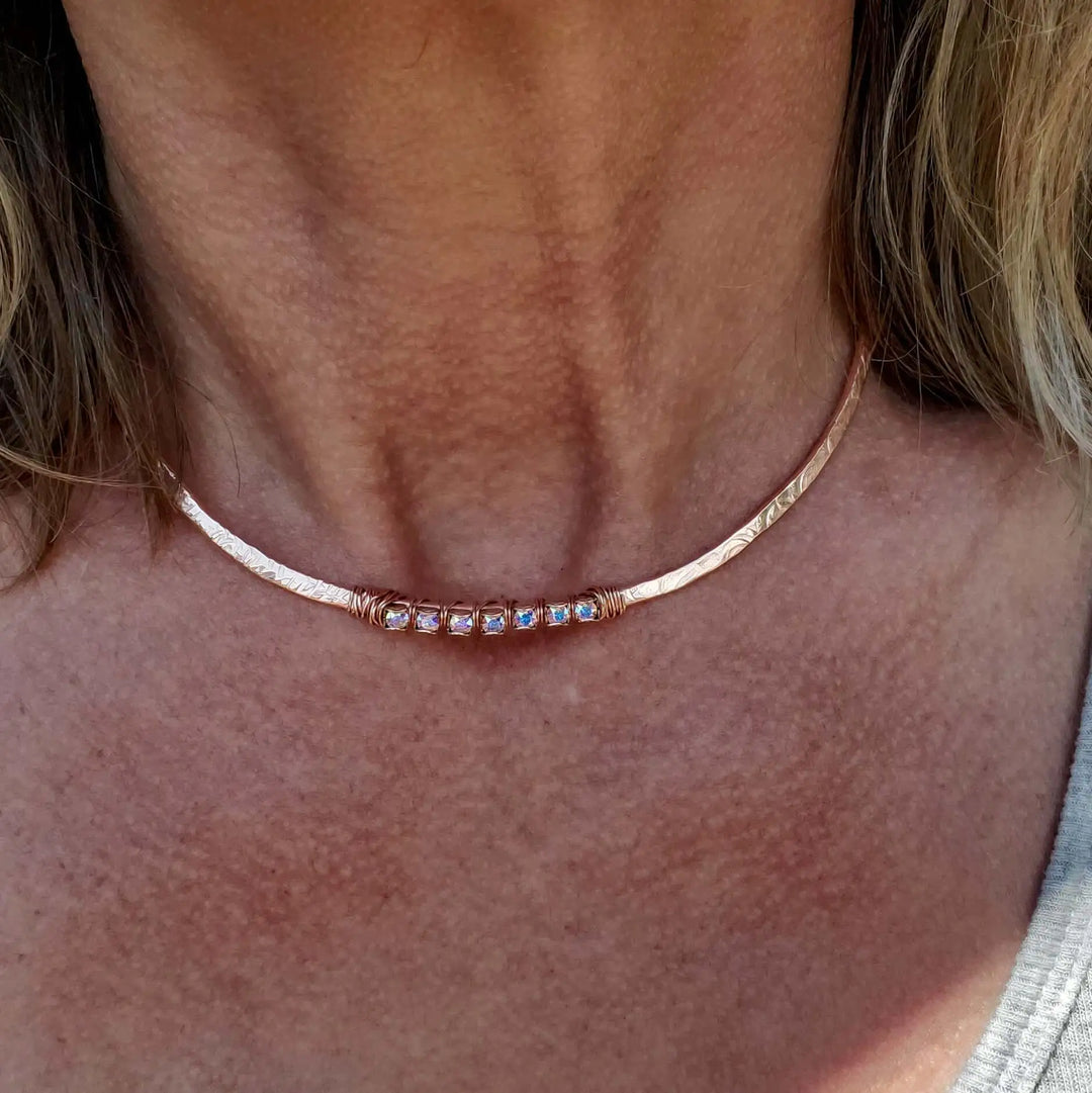 Handmade 7-year anniversary Copper Crystal Choker Set displayed on a woman&