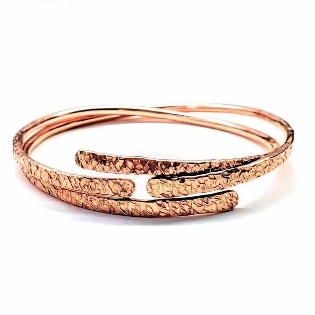 Unisex 8 Gauge Adjustable Hammered Copper Overlap Bangle featuring a unique hammered design and adjustable fit.
