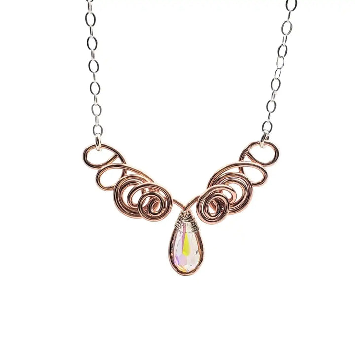 Handmade Sculpted Copper Silver Angel in Flight Necklace with elegant swirls and a sparkling drop pendant.