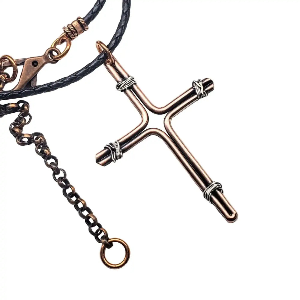 Handmade Large Copper and Silver Wire Cross Necklace for Men on a black cord with metal accents.
