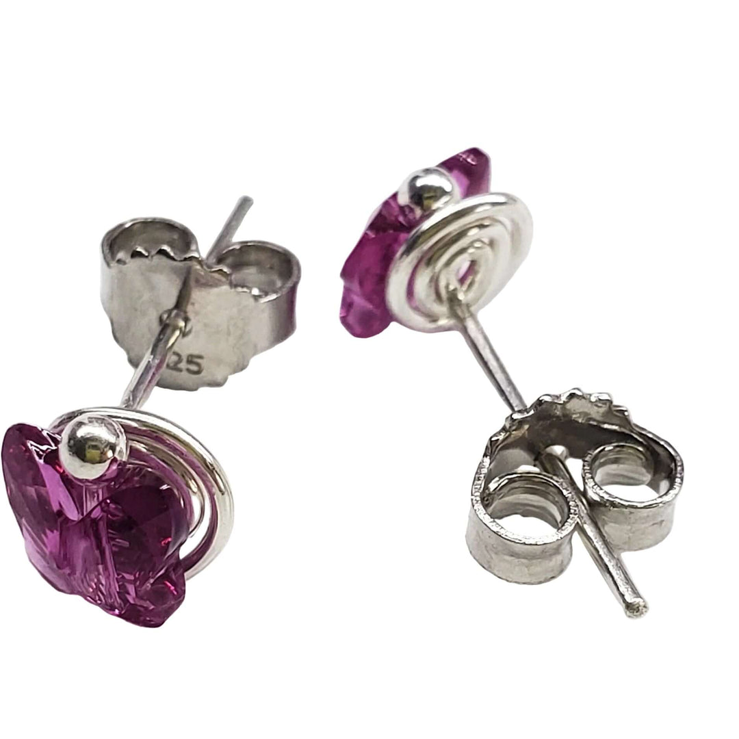 5mm Spiral Butterfly Earring Studs in sterling silver with pink Swarovski crystals, showcasing a delicate and bold design.
