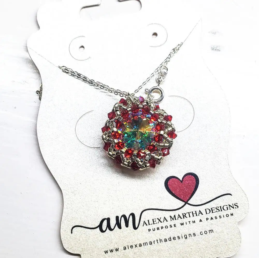 Beaded Super Sparkly Swarovski Rosette Star Pendant Necklace showcased on a display card with a silver chain.