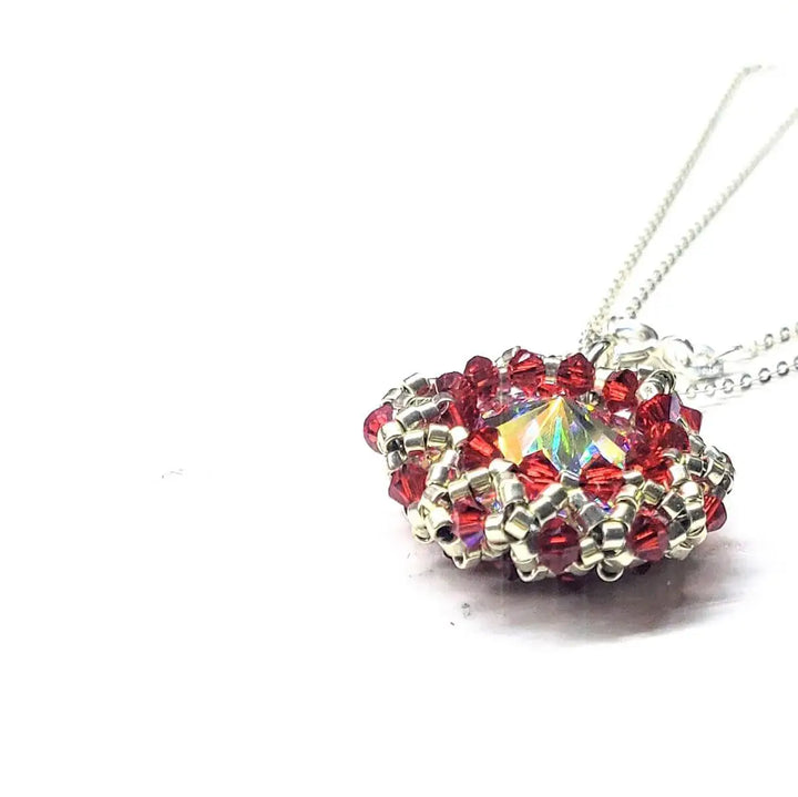 Beaded Super Sparkly Swarovski Rosette Star Pendant Necklace featuring red beaded design and shimmering crystals.