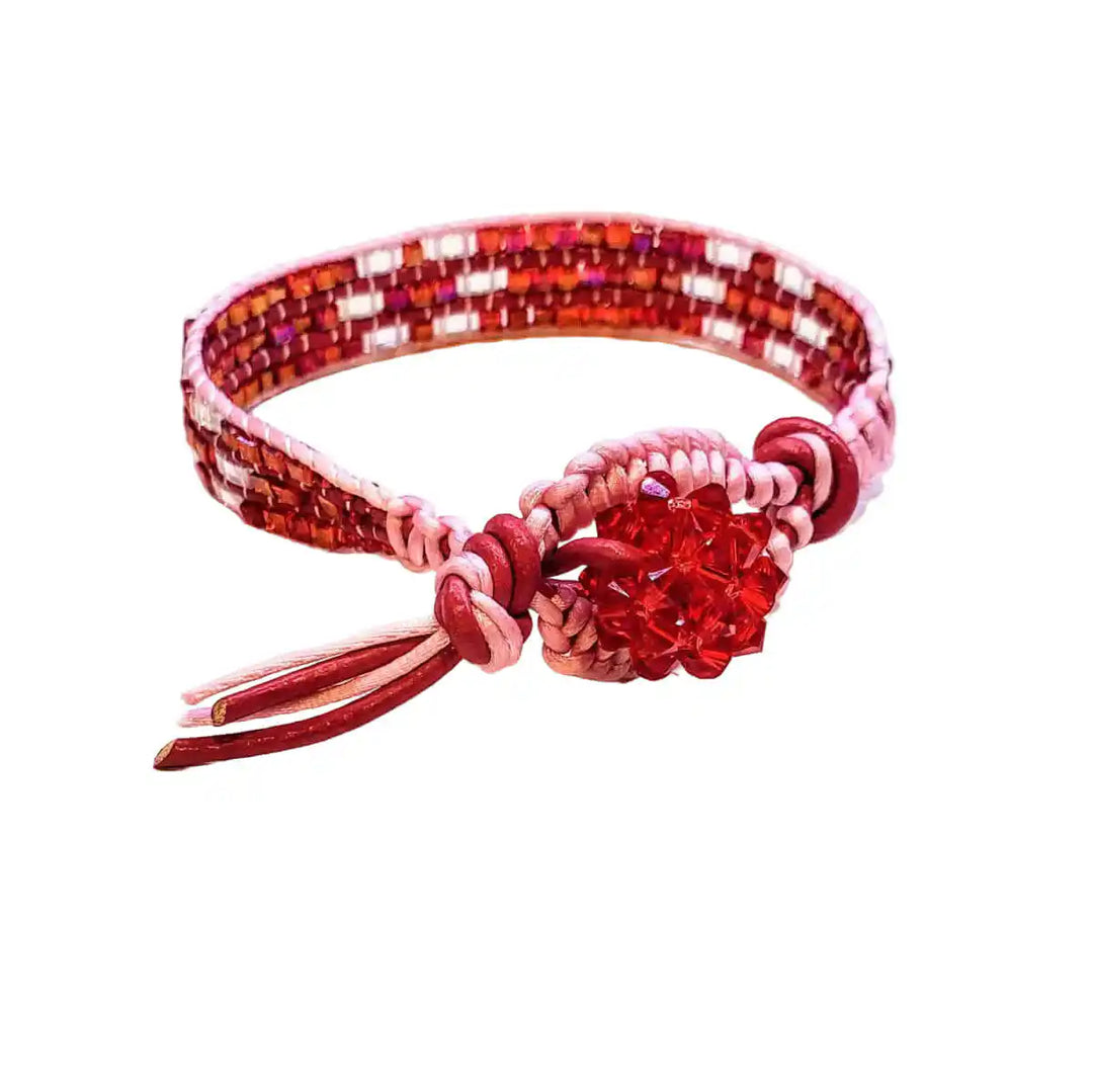 Leather Silk Bead Woven Crystal Button Bracelet featuring red leather, pink silk, and sparkling Swarovski crystals.