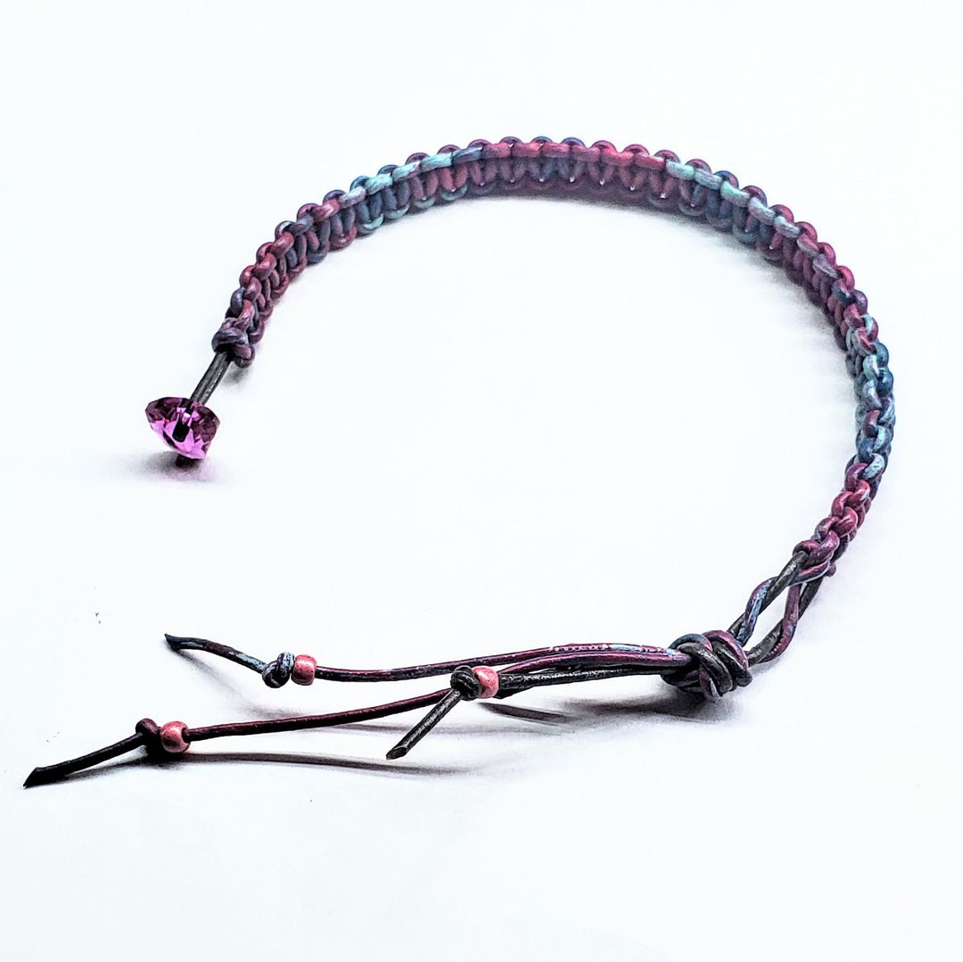 Macrame tie-dye leather Crystal bracelet featuring vibrant colors and a sparkling crystal detail.