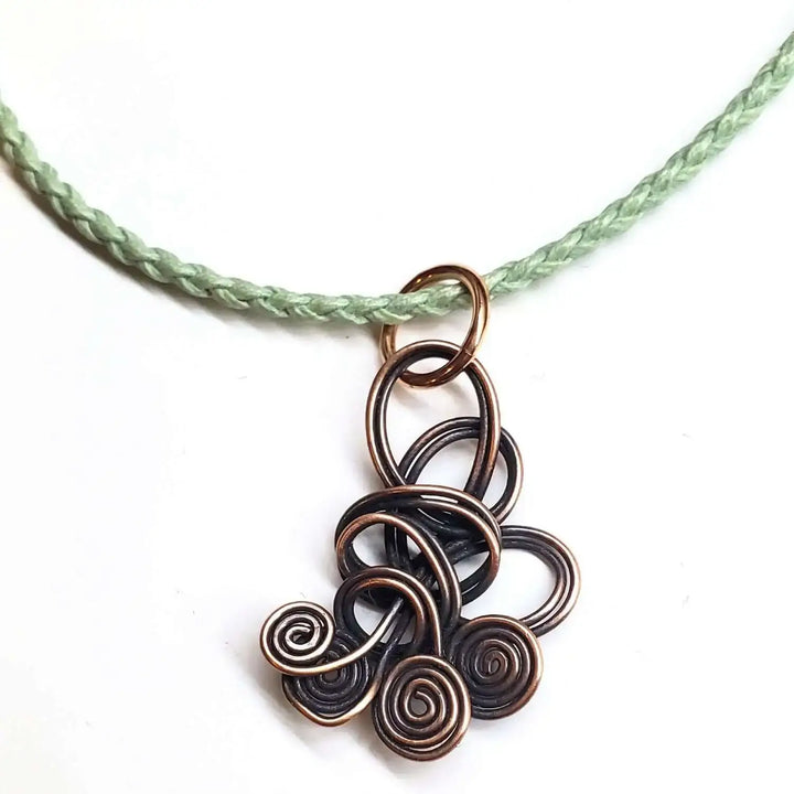 Reversible Interchangeable Copper Wire Sculpted Necklaces featuring unique copper wire design.