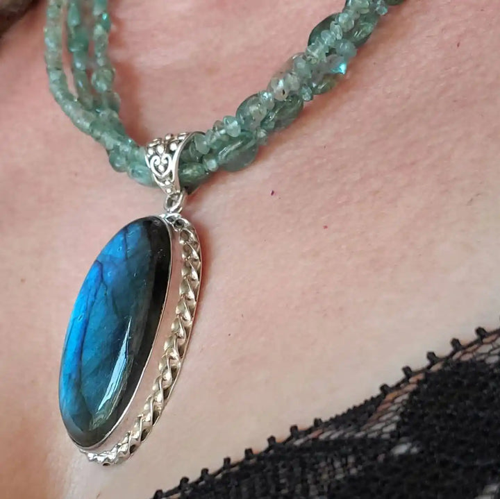 Multi Strand Blue Green Silver Bezel Labradorite Necklace featuring a stunning labradorite pendant.