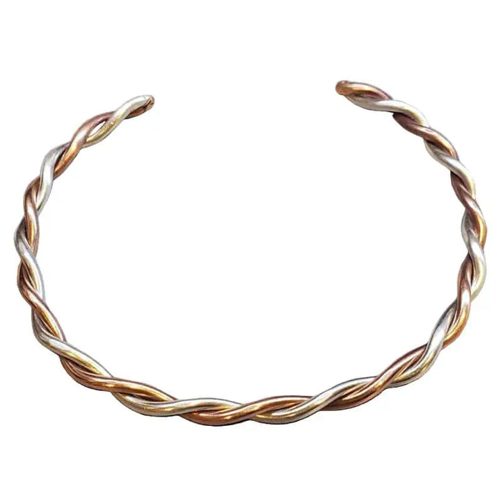 Thick Copper and Sterling Silver Twisted Bangle showcasing handcrafted intertwining design.