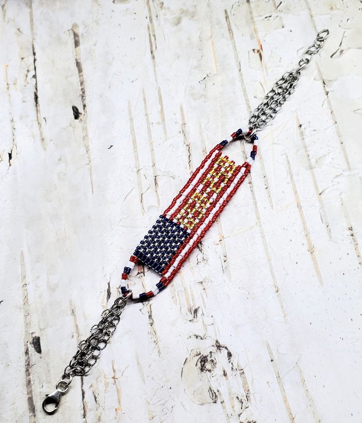 USA 250th Anniversary Beaded Bracelet By Alexa Martha showcasing intricate beadwork with red, white, and blue design.