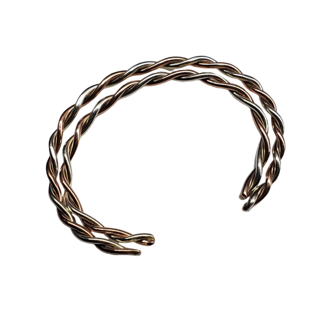 Handmade twisted copper and sterling silver couples cuff  featuring intertwined 12-gauge wires