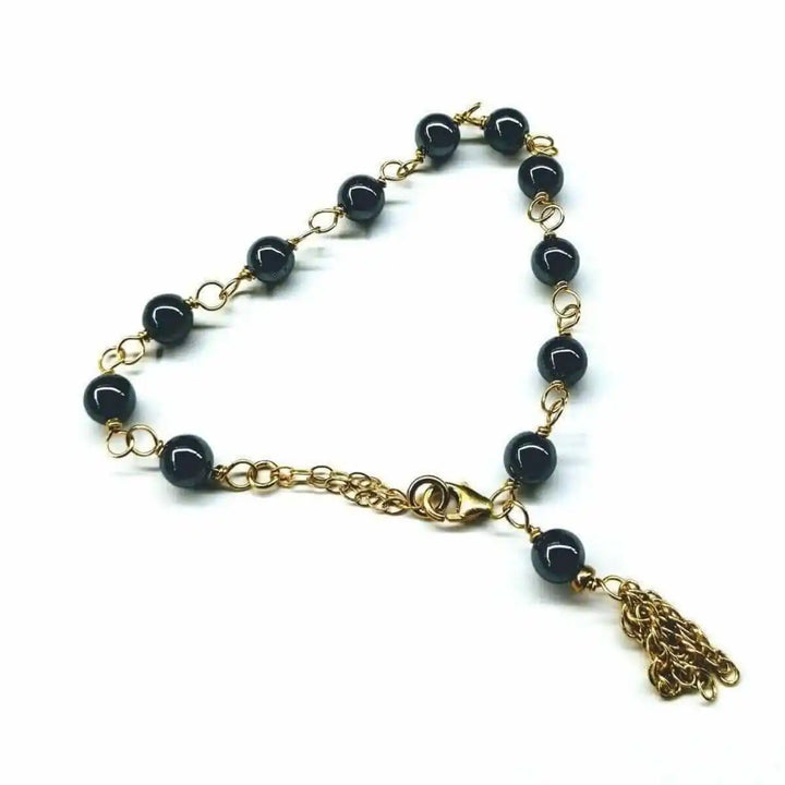 Adjustable 14 KT Gold Filled Hematite Chain Tassel Bracelet featuring gold chain and hematite beads.