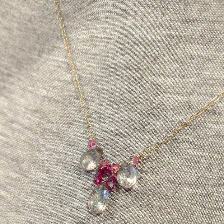 Adjustable Gold Filled Wire Wrapped Gemstone Necklace featuring mystic rainbow quartz and sparkling fuchsia Swarovski crystals.
