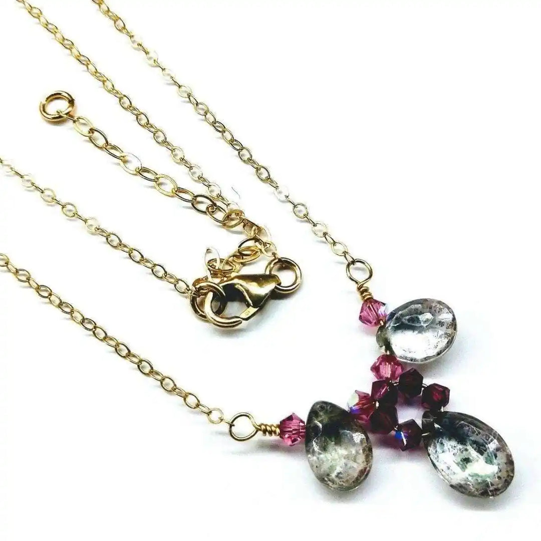 Adjustable Gold Filled Wire Wrapped Gemstone Necklace featuring mystic rainbow quartz drops and fuchsia Swarovski crystals.