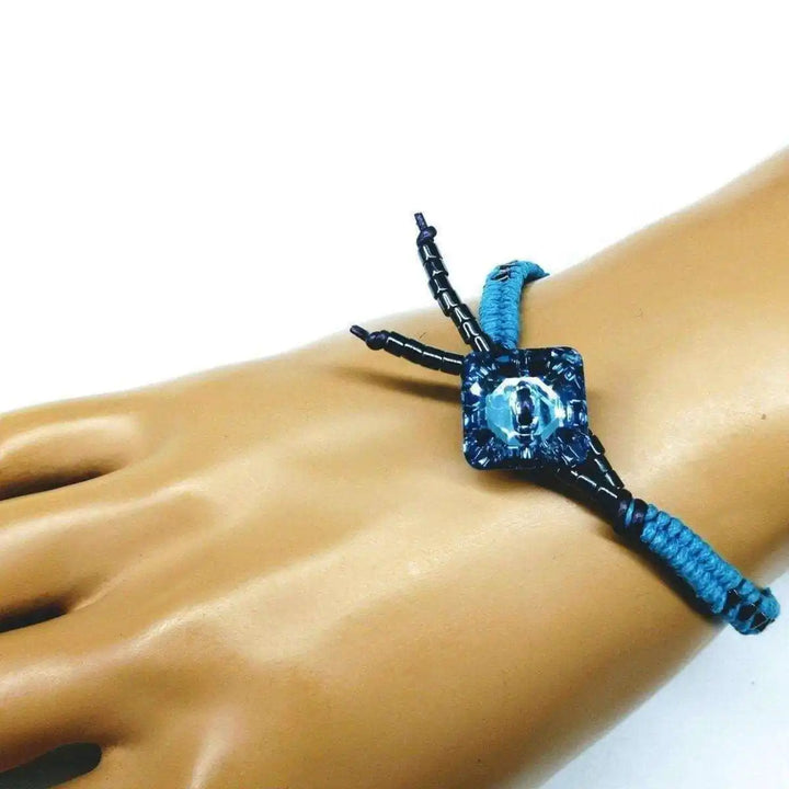 Aqua Hematite Bead Braided Swarovski Crystal Button Bracelet on a model&