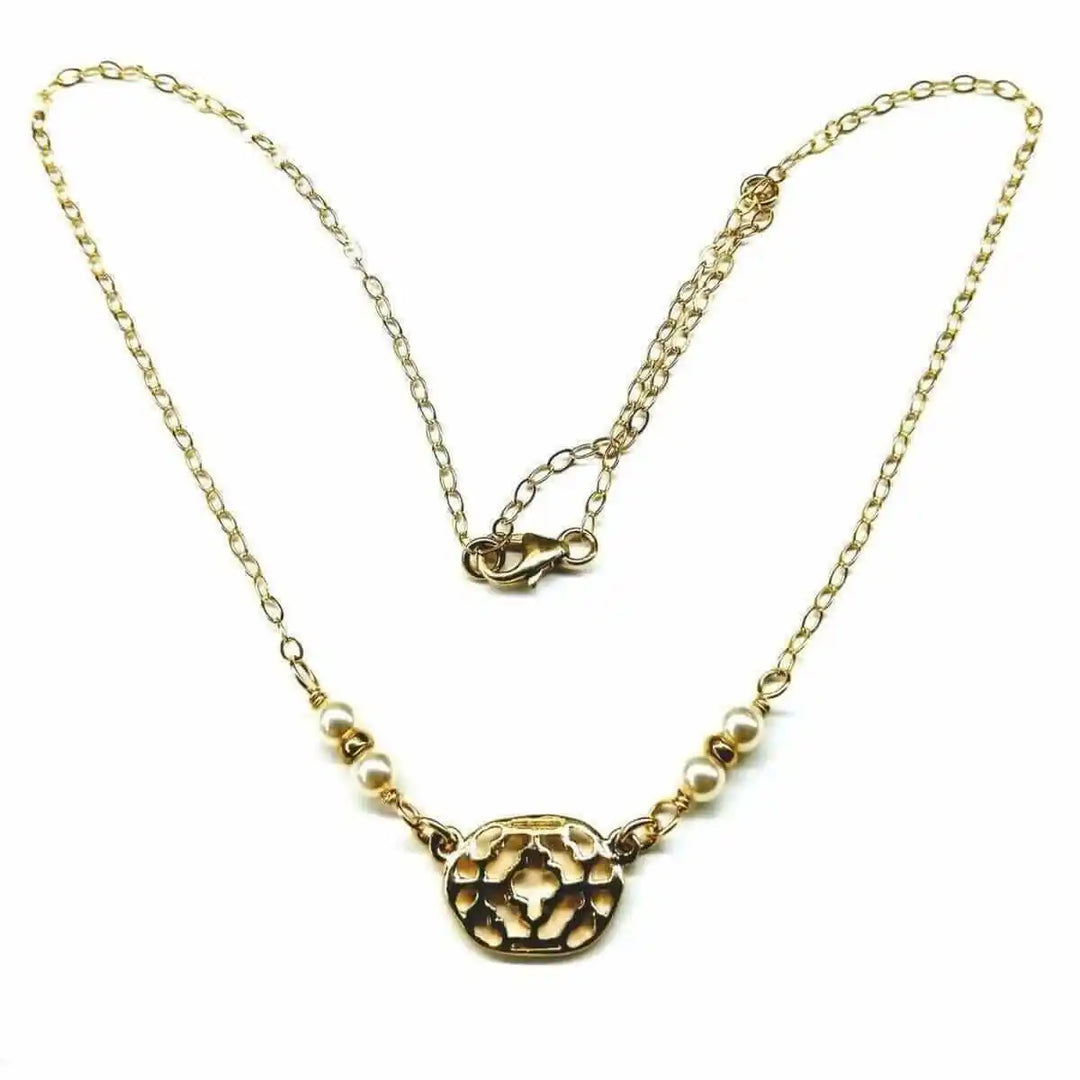 As Seen on Molly Ringwald Gold Filled Pearl Choker Necklace showcasing elegant gold chain and pearl accents.