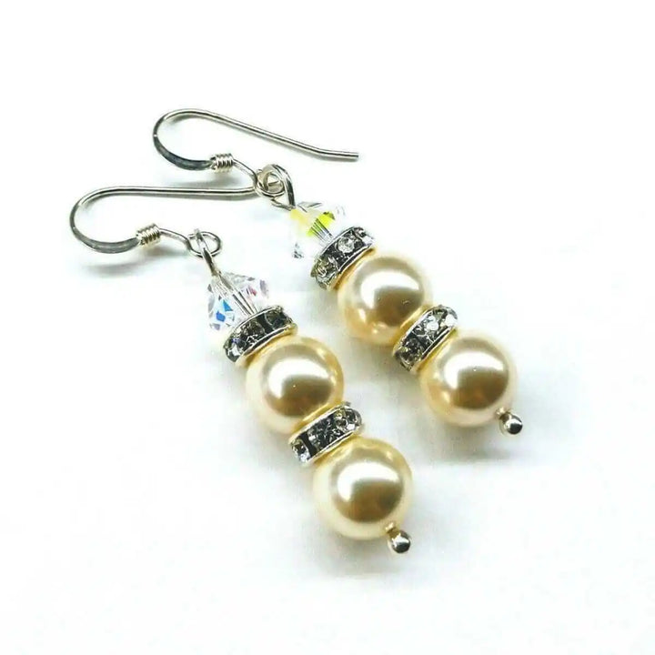 Bridal Sterling Silver Stacked Crystal and Pearl Earrings showcasing elegant pearls and sparkling crystals.