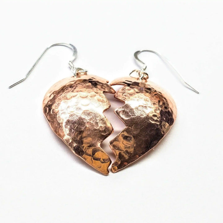 Handmade Sculpted Copper Broken Heart Earrings featuring intricate hammered texture and a unique broken heart design.