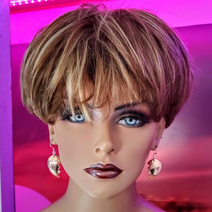 Handmade Sculpted Copper Broken Heart Earrings showcased on a model with short hair, highlighting their unique design.