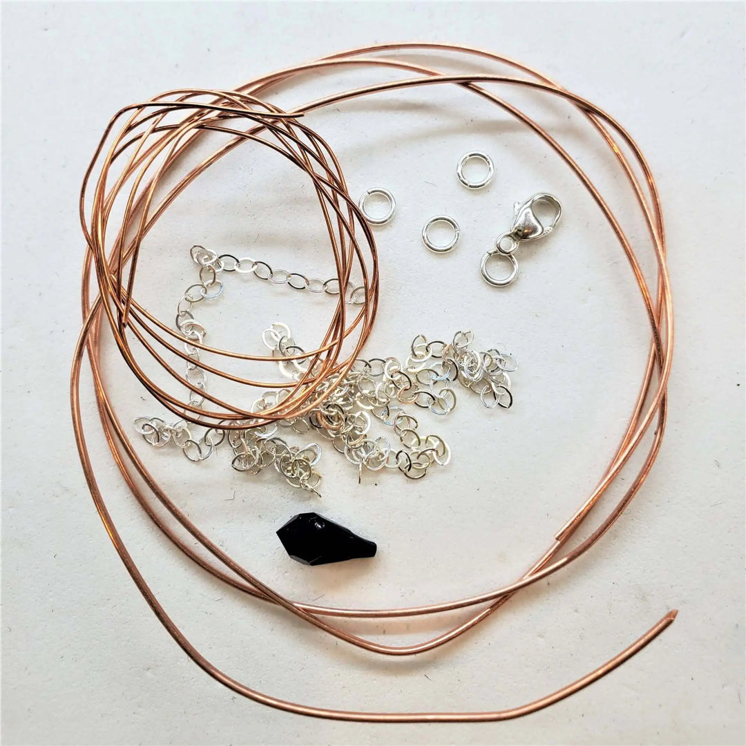 complete jewelry set making tutorials kits bundle materials including wire, chains, beads, and clasps for jewelry crafting.