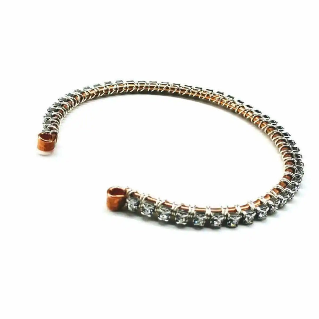 Catch-Free Crystal Rhinestone Tennis Bracelet Bangle featuring Swarovski-quality crystals on a hammered copper bangle.