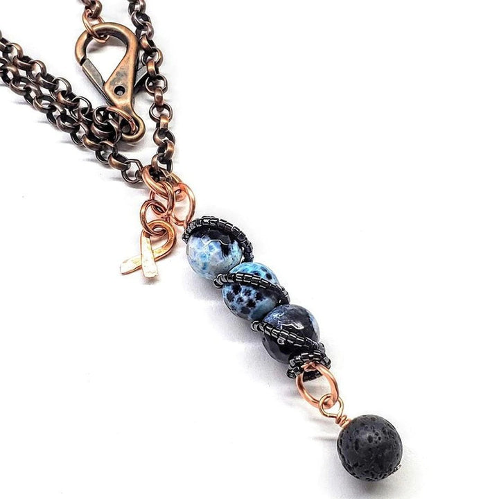 Child Abuse Awareness Agate Necklace With Lava Rock Bead featuring blue agate beads and lava rock charm.