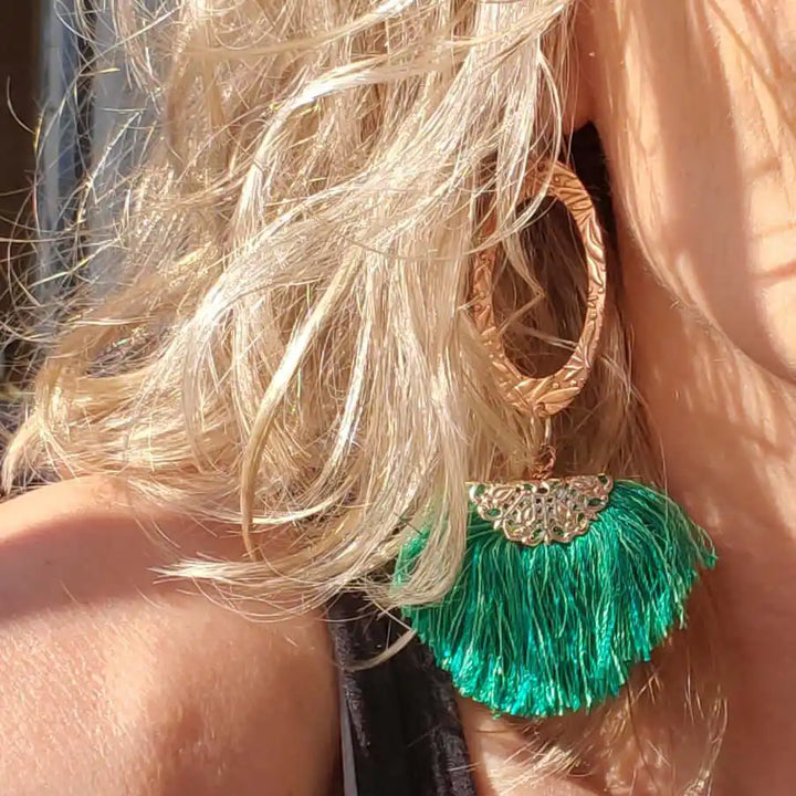 Rose Gold Filigree Silk Tassel Earrings Copper Embossed with vibrant green tassels and intricate metalwork.