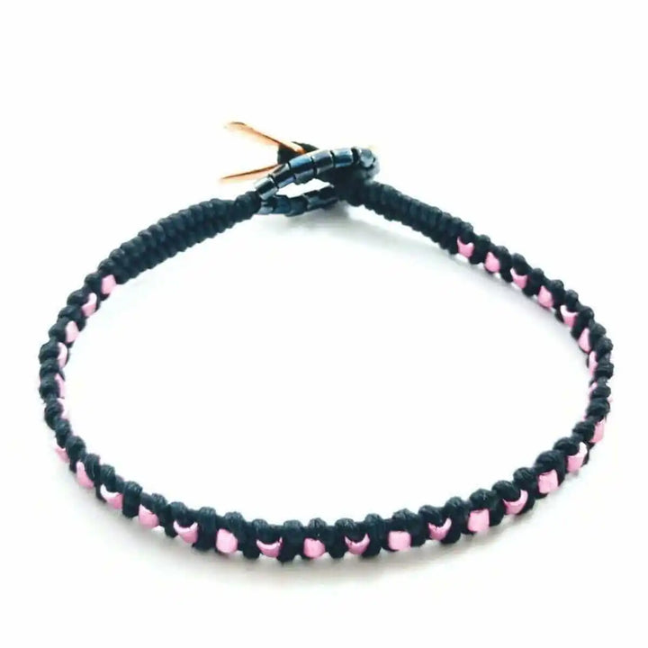 Copper Ribbon Black Pink Braided Breast Cancer Bracelet with black and pink braided design and copper accents.