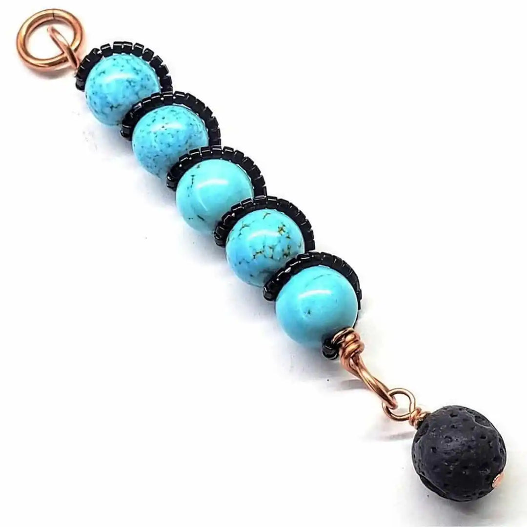 copper turquoise pendant with lava rock charm featuring stunning blue turquoise beads and a lava rock accent