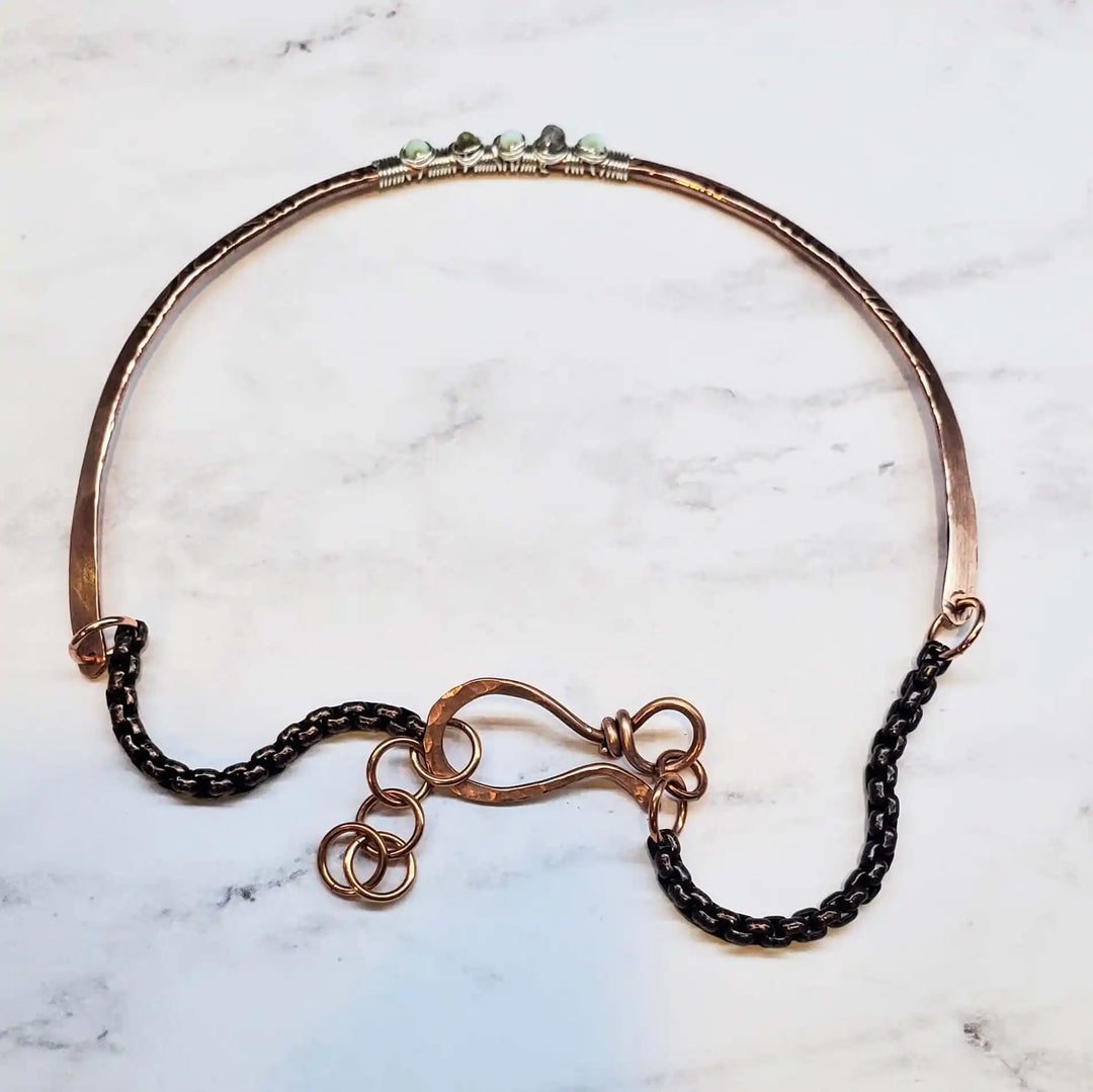 Ergonomic Copper Sculpted Embossed Wire Gemstone Choker featuring stylish black chain and Peruvian opal gemstones.