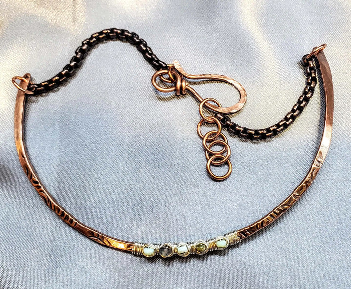 Ergonomic Copper Sculpted Embossed Wire Gemstone Choker featuring natural gemstones and intricate metalwork.