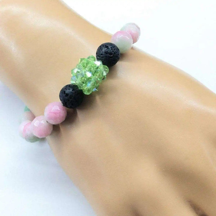 Gem Packed Watermelon Jade Crystal Lava Rock Bracelet featuring pink jade and lava rock beads on a model&