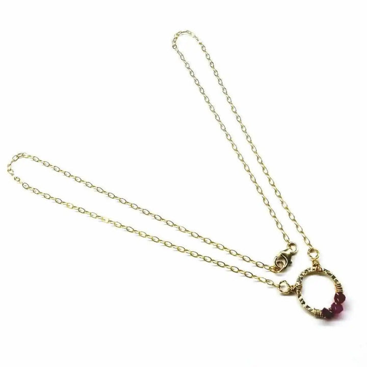 Gold Filled Pink Chalcedony Open Circle Necklace featuring a delicate open circle pendant and chain.