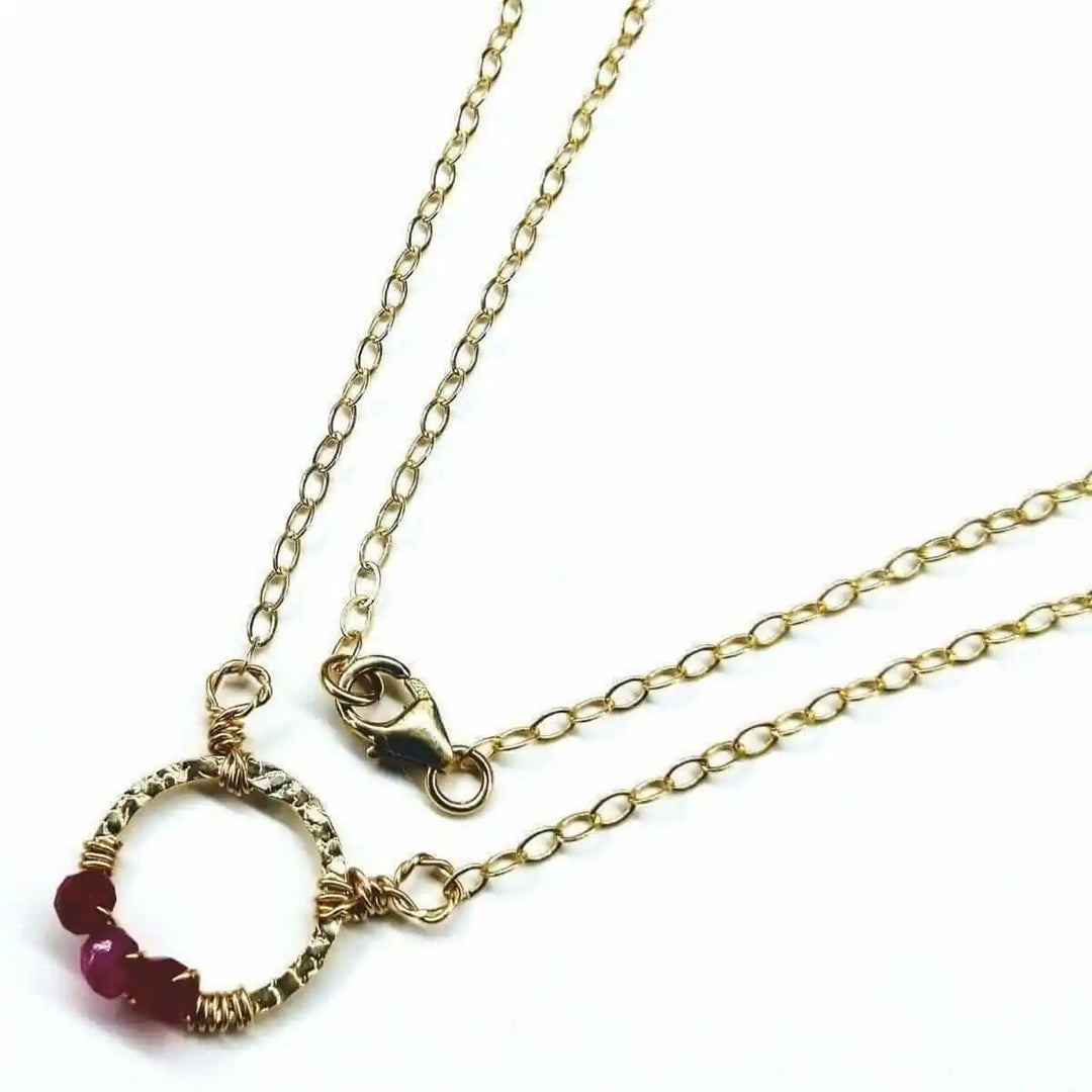 Gold Filled Pink Chalcedony Open Circle Necklace with delicate chain and gemstone accents.