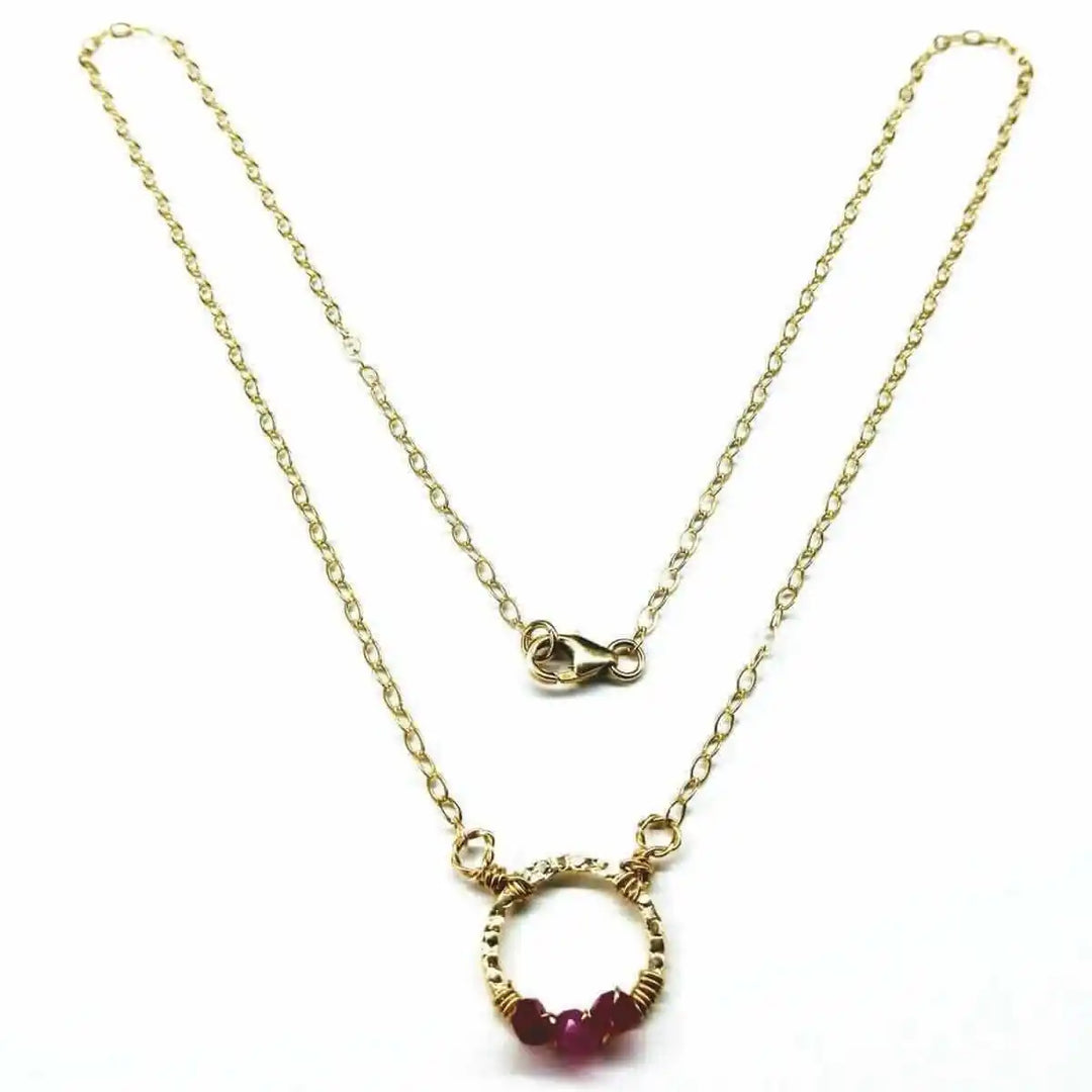 Gold Filled Pink Chalcedony Open Circle Necklace featuring a hand-hammered pendant and vibrant gemstones.