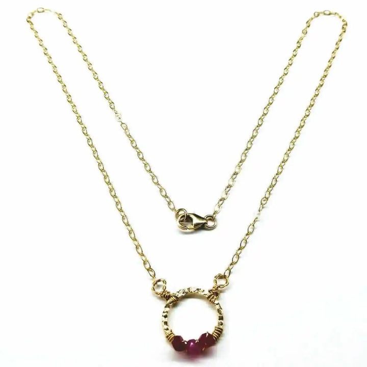 Gold Filled Pink Chalcedony Open Circle Necklace featuring a hand-hammered pendant and vibrant gemstones.