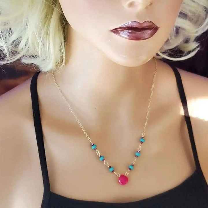 Gold Filled Pink Chalcedony Turquoise Gemstone Drop Necklace displayed on a mannequin with blonde hair.