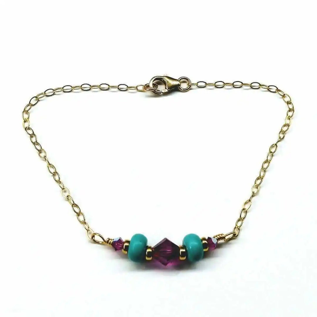 Handmade Gold Filled Pink Turquoise Gemstone Bracelet featuring turquoise beads and fuchsia Swarovski crystals.